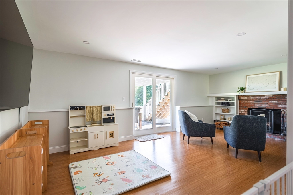 22 Sagamore Road Ipswich, MA 01938 - Photo 22 of 39 a living room with furniture and a flat screen tv