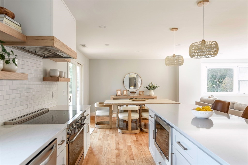 22 Sagamore Road Ipswich, MA 01938 - Photo 5 of 39 a kitchen with a sink a stove and a wooden floors