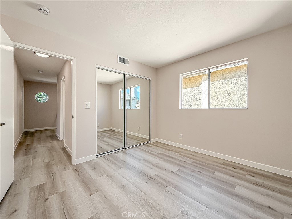 12392 Carl Street Pacoima, CA 91331 - Photo 40 of 55 wooden floor in an empty room
