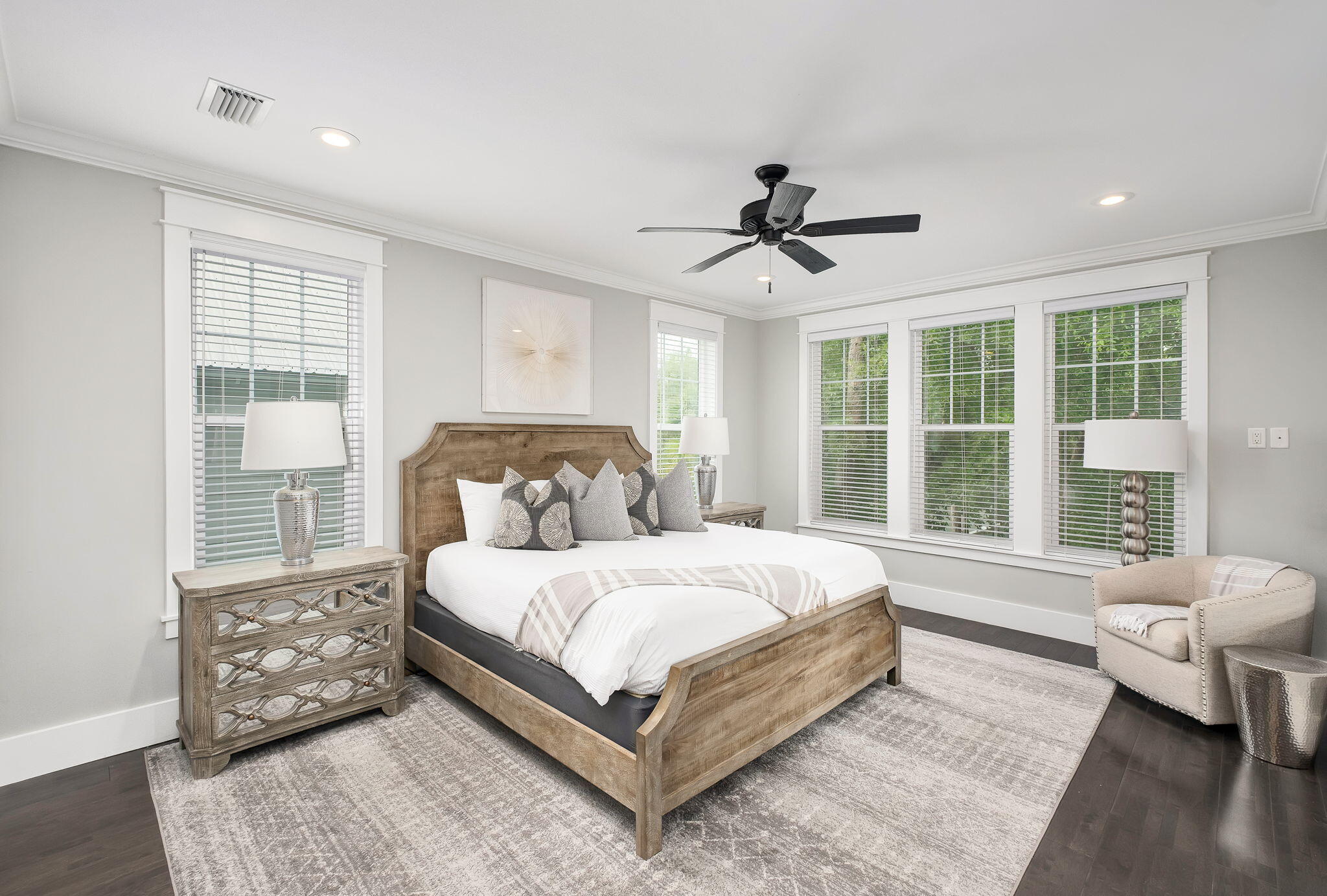 2846 South County Highway 395 Santa Rosa Beach, FL 32459 - Photo 5 of 19 a bedroom with a large bed and a chandelier