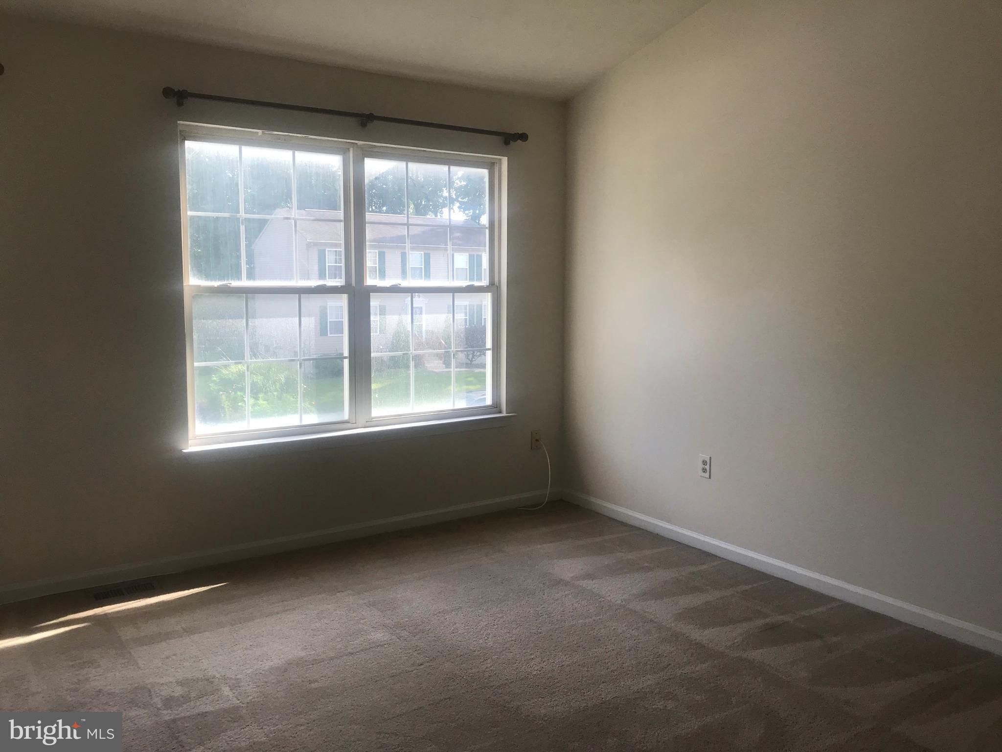 122 Cherry Tree Lane Elkton, MD 21921 - Photo 5 of 7 an empty room with a window