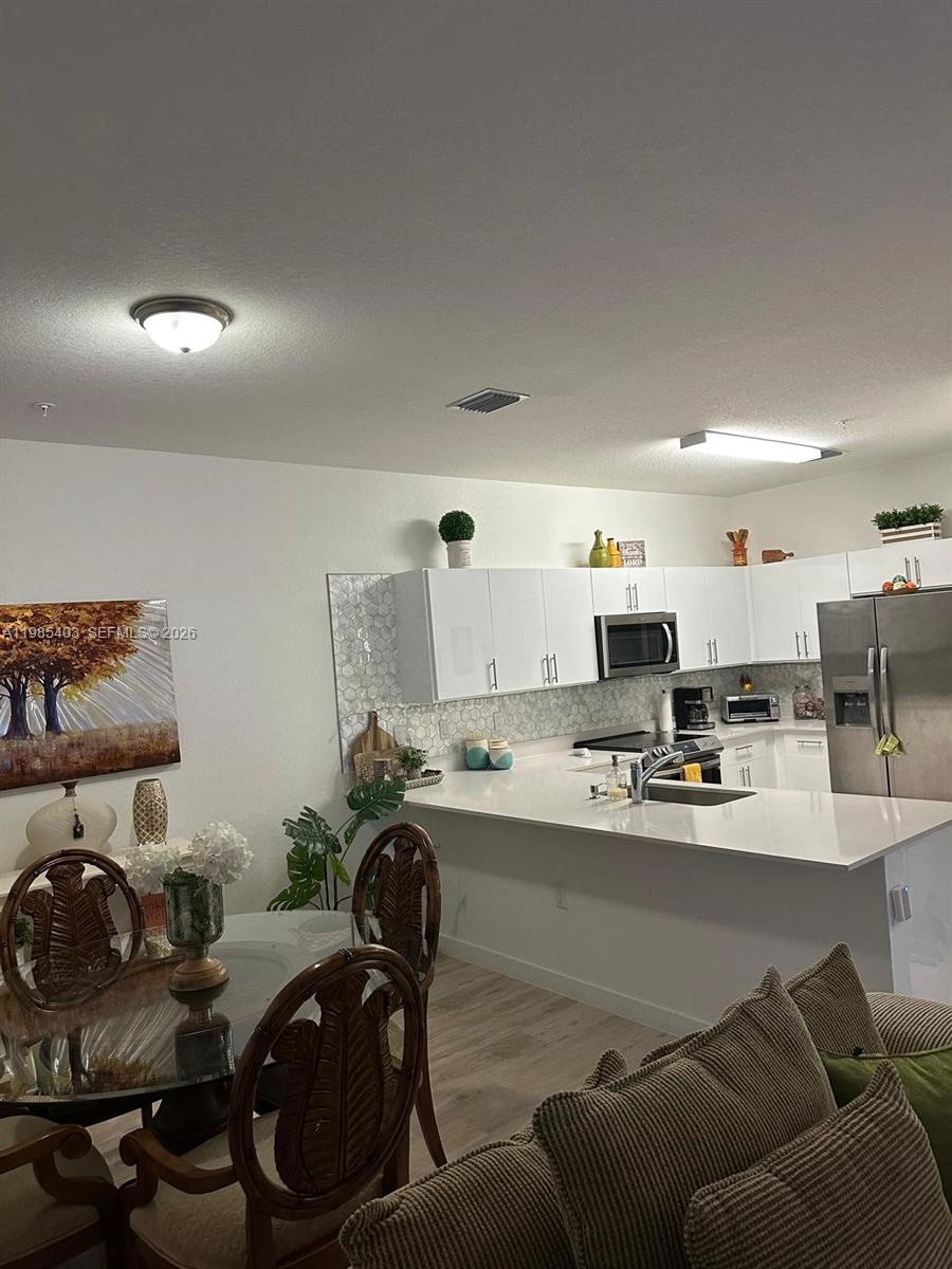 15540 Southwest 136th Street, Unit 109 Miami, FL 33196 - Photo 6 of 18