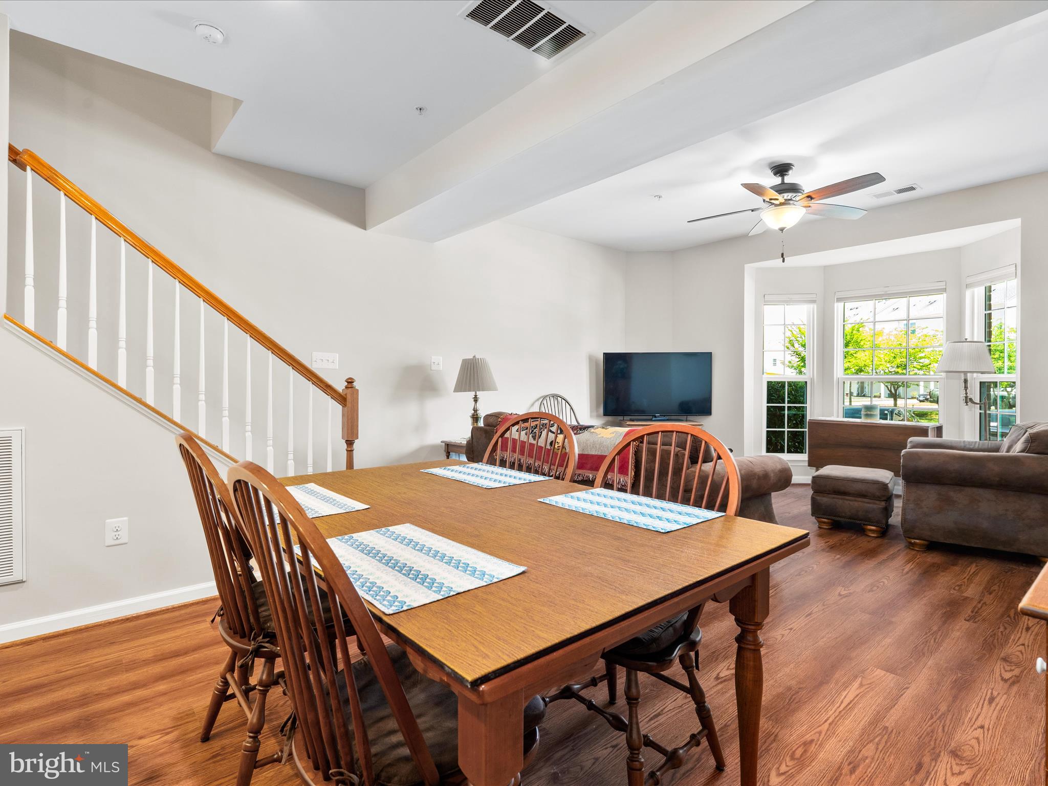 5039 Small Gains Way Frederick, MD 21703 - Photo 13 of 34 a view of a dining room with furniture window and wooden floor