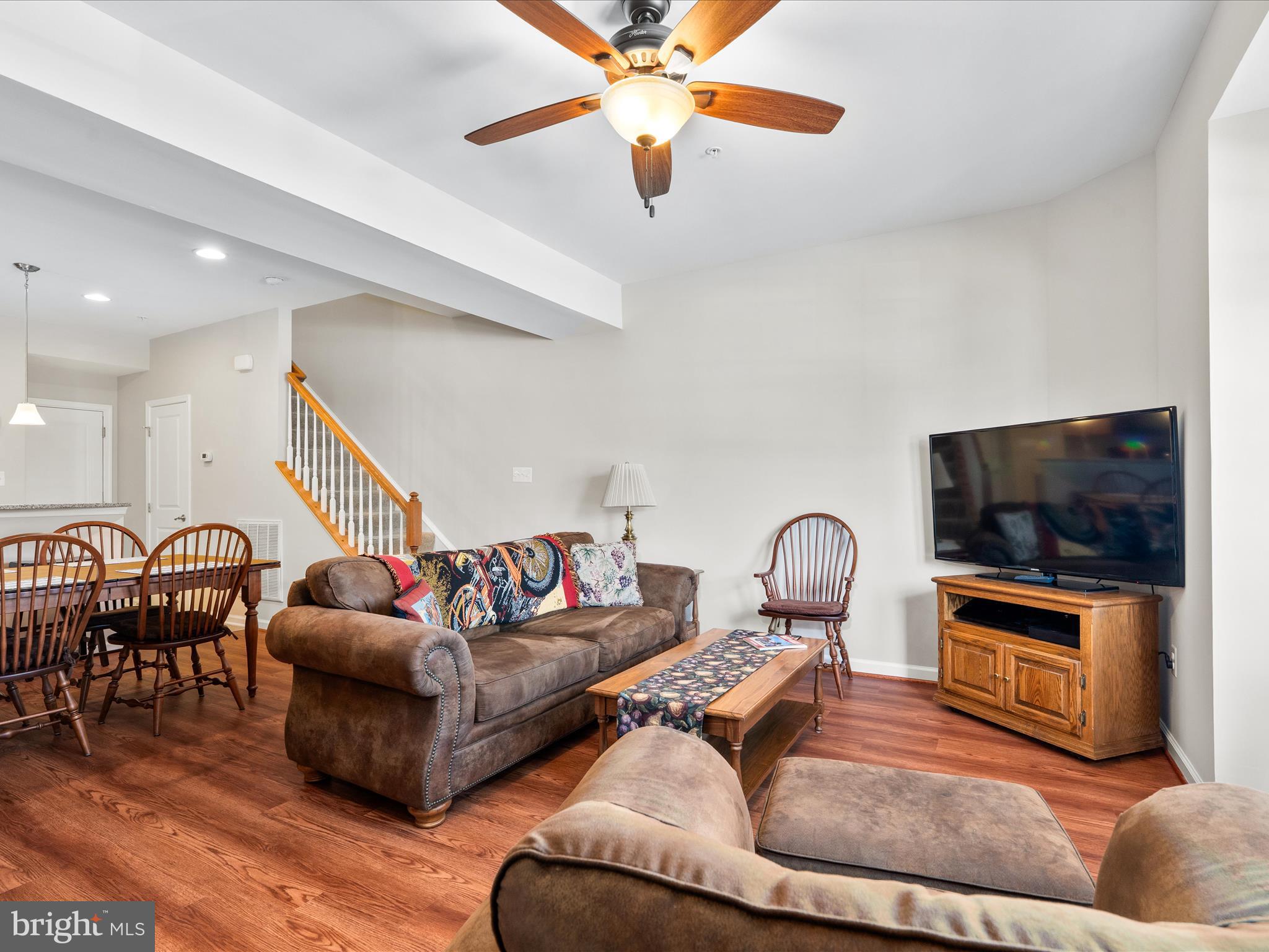5039 Small Gains Way Frederick, MD 21703 - Photo 14 of 34 a living room with furniture and a flat screen tv