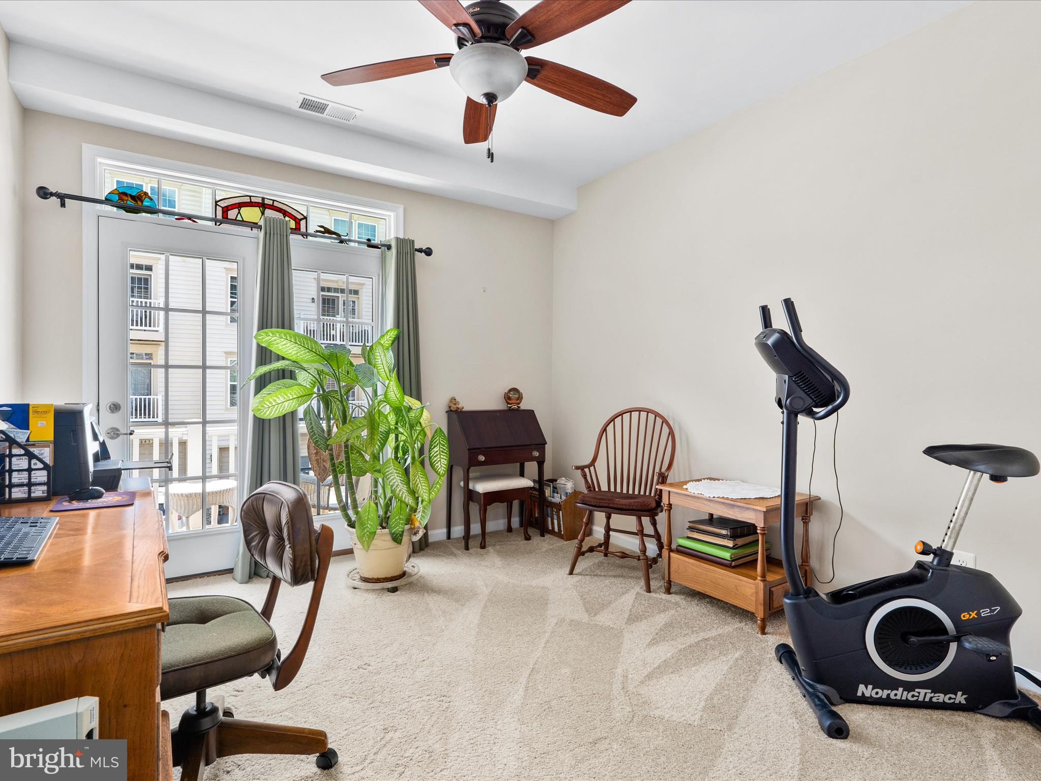 5039 Small Gains Way Frederick, MD 21703 - Photo 22 of 34 a workspace with furniture and chandelier