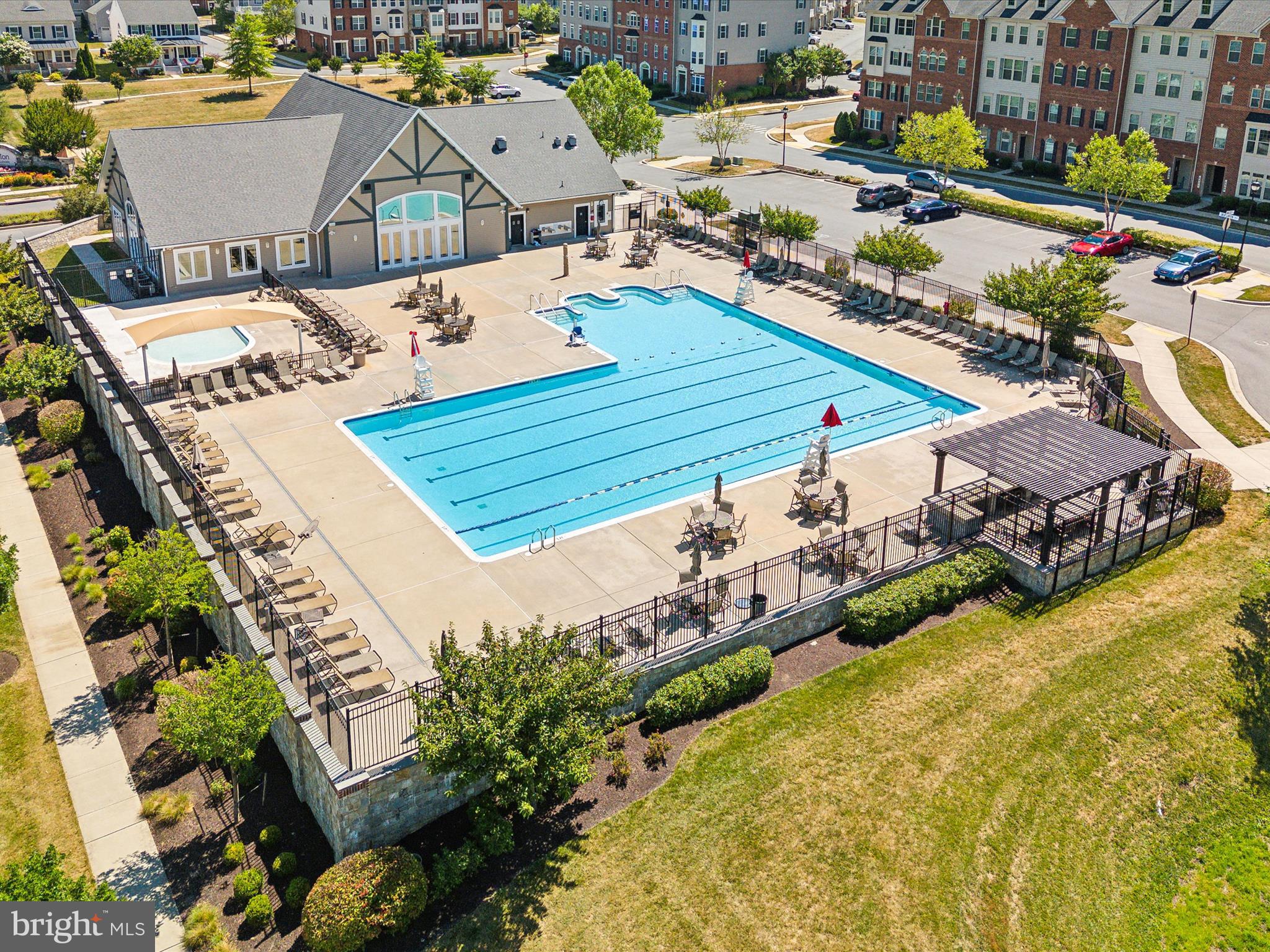5039 Small Gains Way Frederick, MD 21703 - Photo 31 of 34 an aerial view of a house with a swimming pool