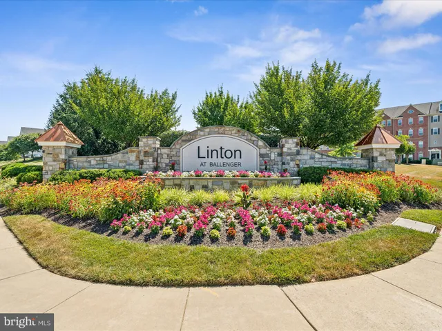 a view of a sign board with a big yard