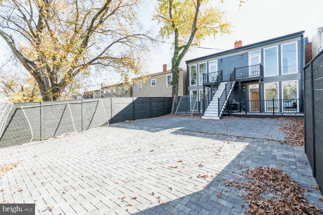 1352 Bryant Street Northeast, Unit P2 Washington, DC 20018 - Photo 1 of 1 a view of a backyard