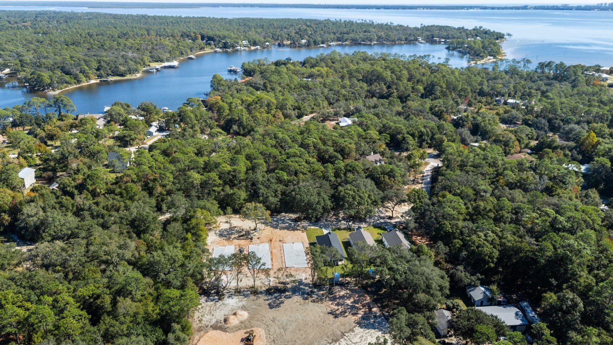 8657 Anniston Drive Elberta, AL 36530 - Photo 17 of 21 Aerial view of a heavily wooded area and a large body of water