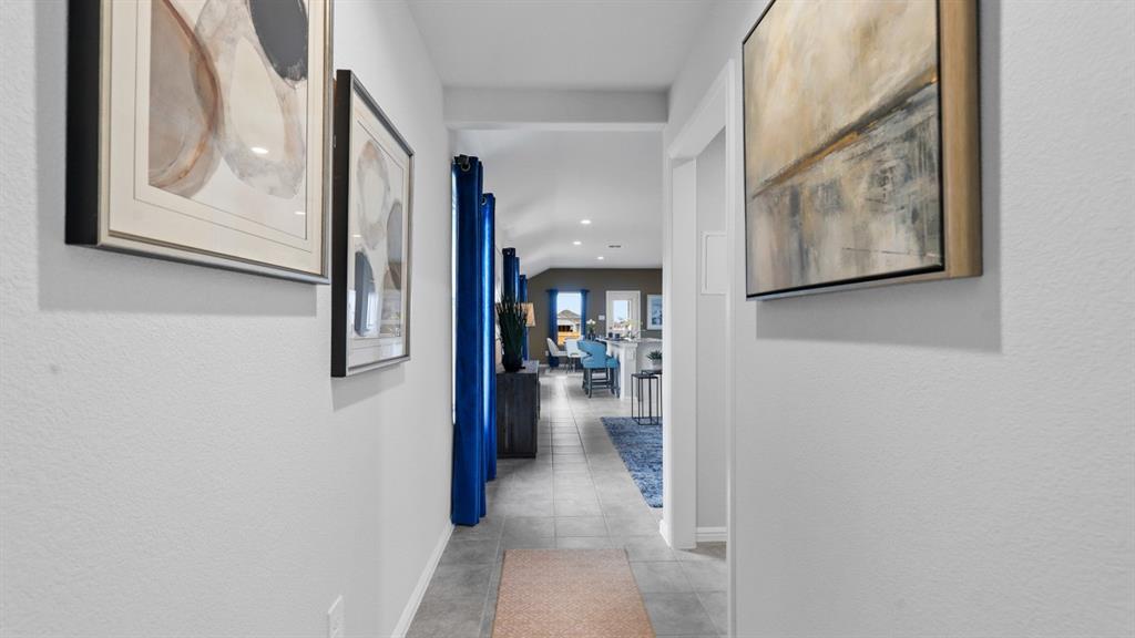 176 Mojave Road Boyd, TX 76023 - Photo 34 of 40 a view of a hallway with wooden floor and dining room