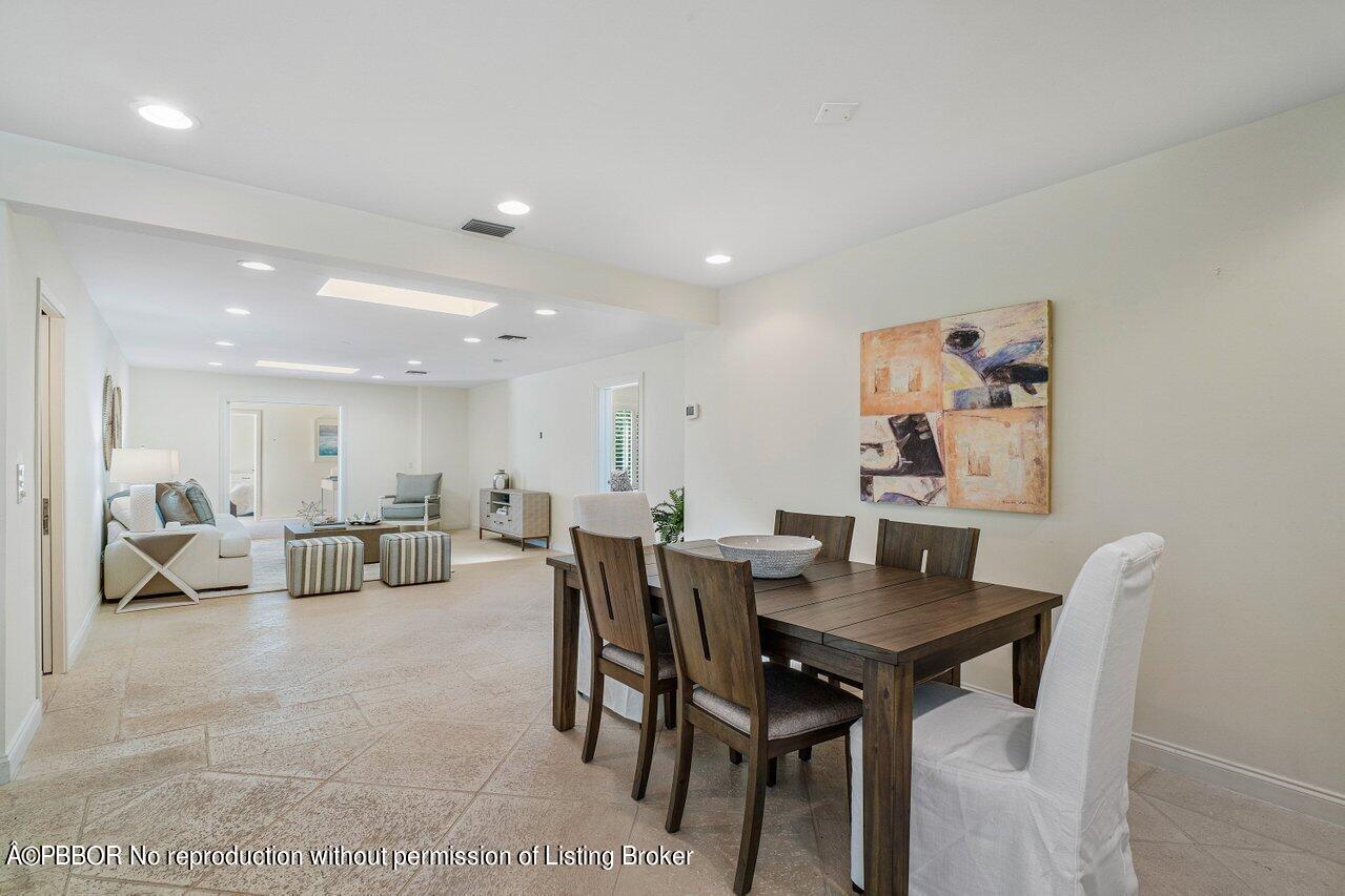 256 Mockingbird Trail Palm Beach, FL 33480 - Photo 11 of 25 a view of a dining room with furniture