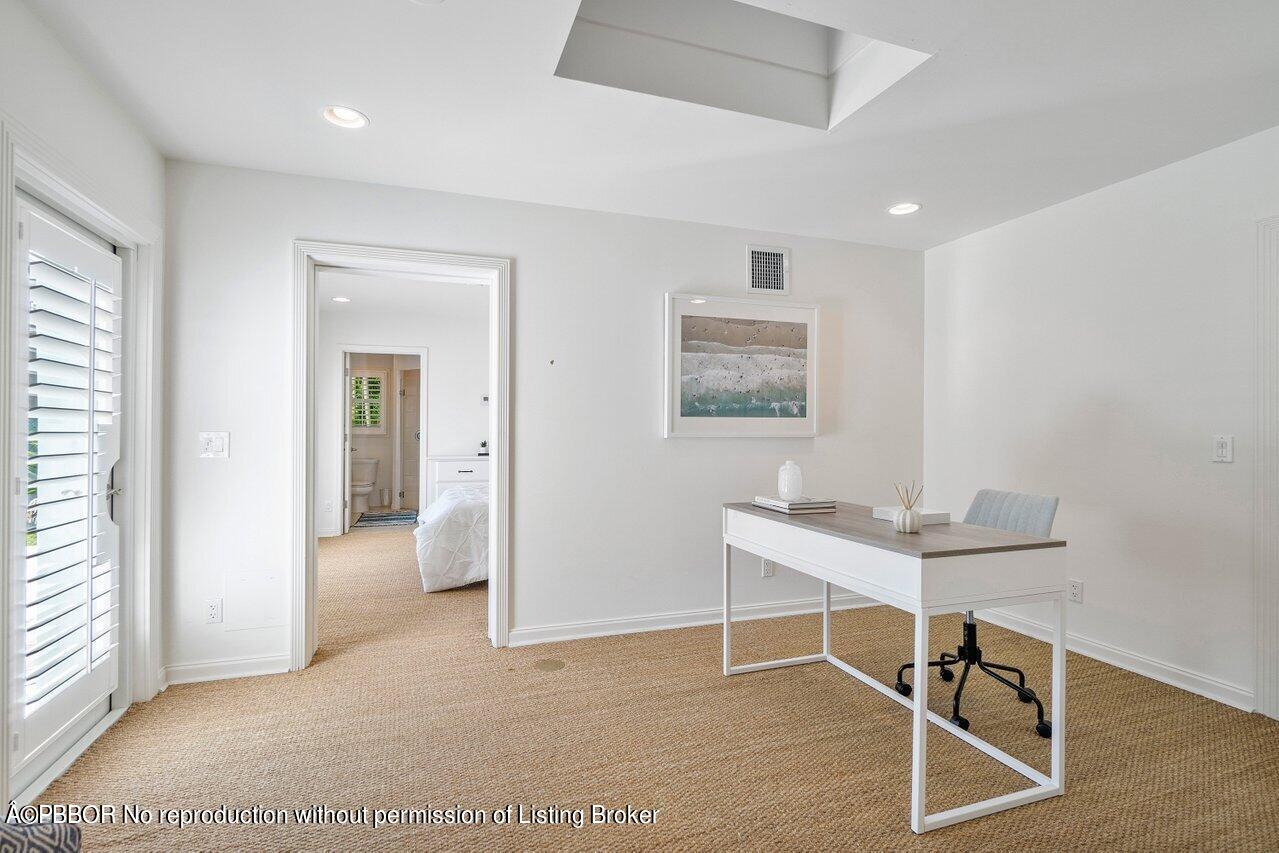 256 Mockingbird Trail Palm Beach, FL 33480 - Photo 21 of 25 a view of a workspace with furniture and a window
