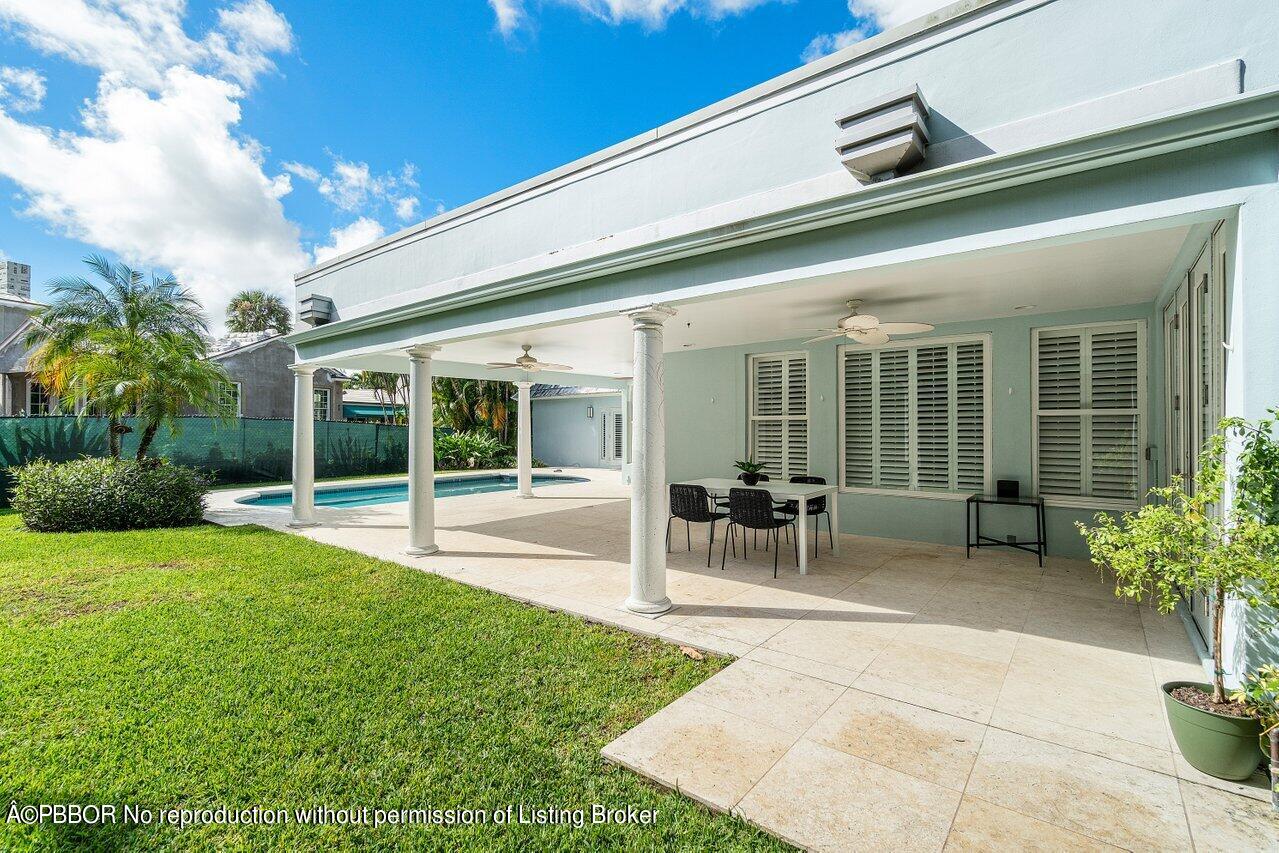 256 Mockingbird Trail Palm Beach, FL 33480 - Photo 24 of 25 a view of a house with backyard porch and sitting area