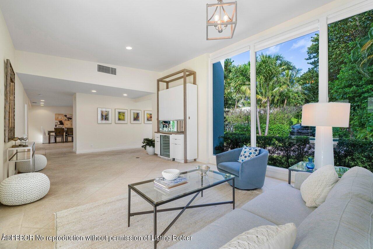 256 Mockingbird Trail Palm Beach, FL 33480 - Photo 6 of 25 a living room with furniture and a large window