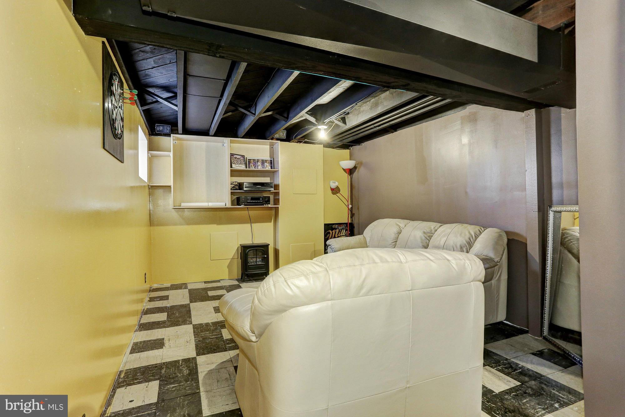 502 North Stuart Street Baltimore, MD 21221 - Photo 11 of 18 Lower Level Recreation Room