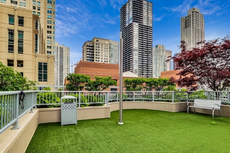 545 North Dearborn Street, Unit 2610 Chicago, IL 60654 - Photo 26 of 37 a view of a house with a yard and sitting area