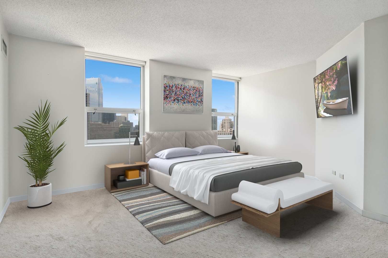545 North Dearborn Street, Unit 2610 Chicago, IL 60654 - Photo 10 of 37 a bedroom with a bed and a potted plant