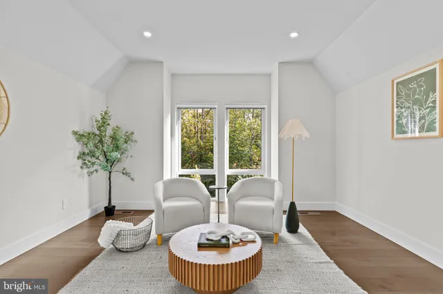 a bathroom with a shower a toilet and sink