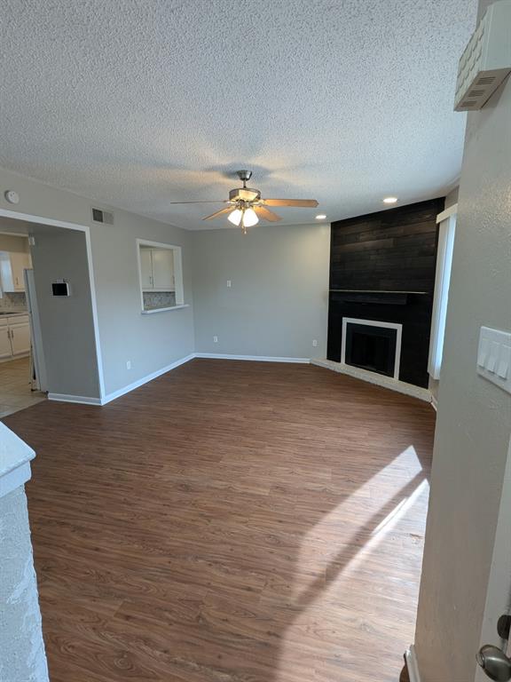 514 East Belt Line Road, Unit B13 DeSoto, TX 75115 - Photo 4 of 28 a view of empty room with a fireplace