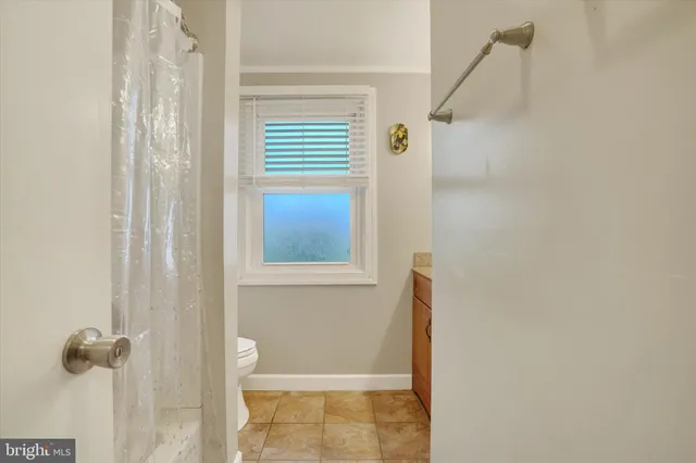 a bathroom with a window