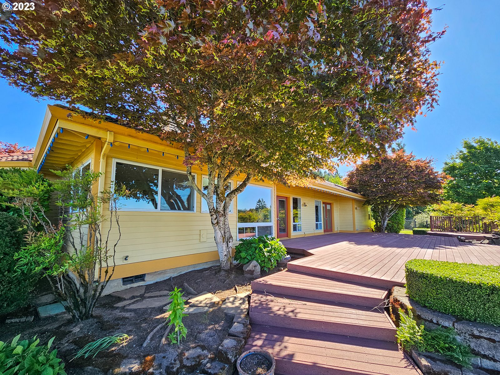 34220 Southwest Firdale Road Cornelius, OR 97113 - Photo 5 of 10 a front view of a house with garden