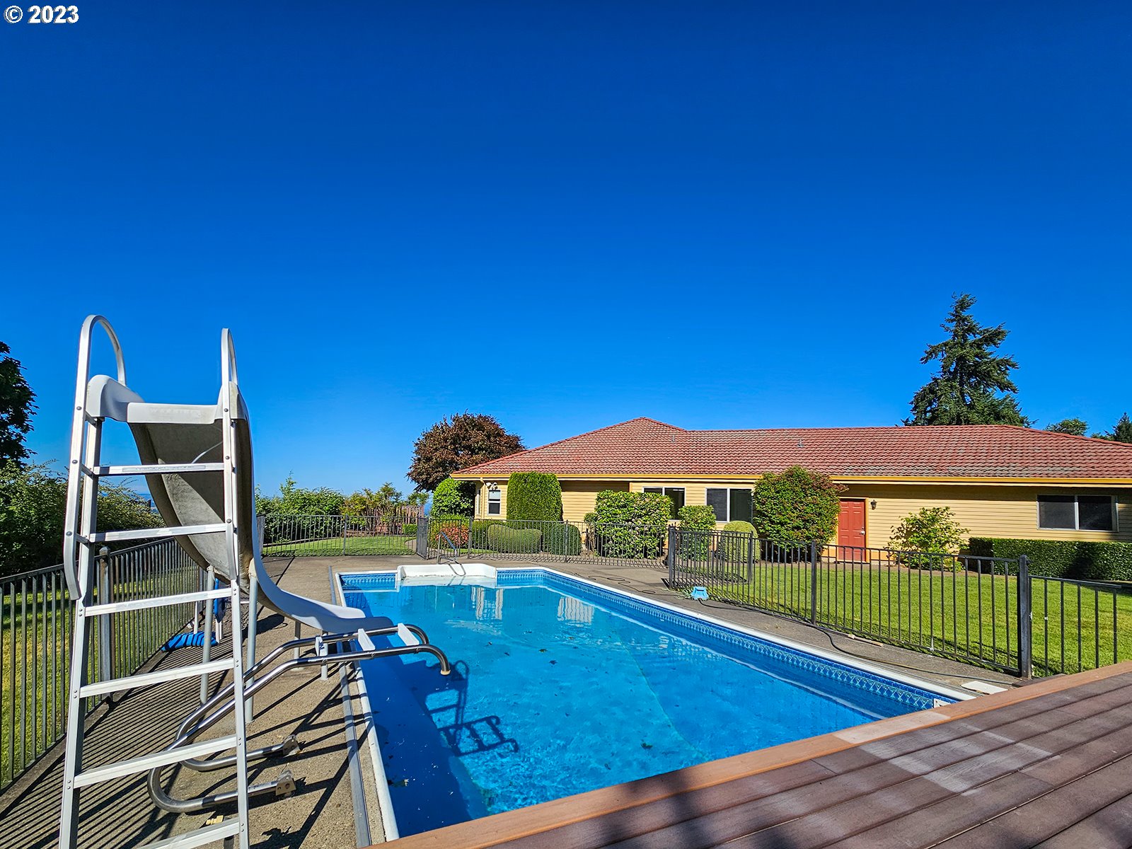 34220 Southwest Firdale Road Cornelius, OR 97113 - Photo 8 of 10 a view of a balcony with two chairs and a table