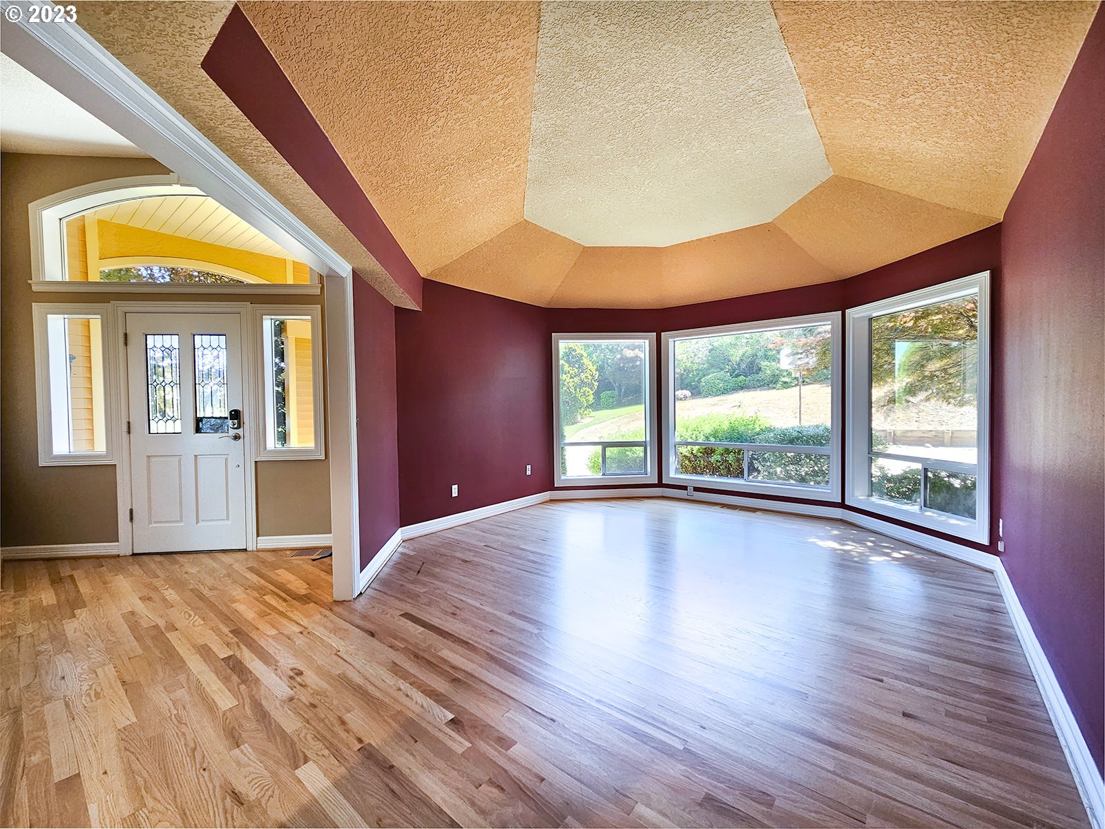 34220 Southwest Firdale Road Cornelius, OR 97113 - Photo 10 of 10 a view of an empty room with wooden floor and a window
