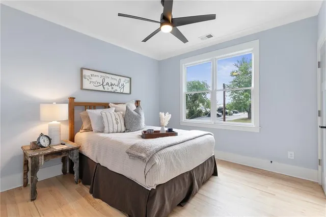 a view of a bedroom with furniture and staircase
