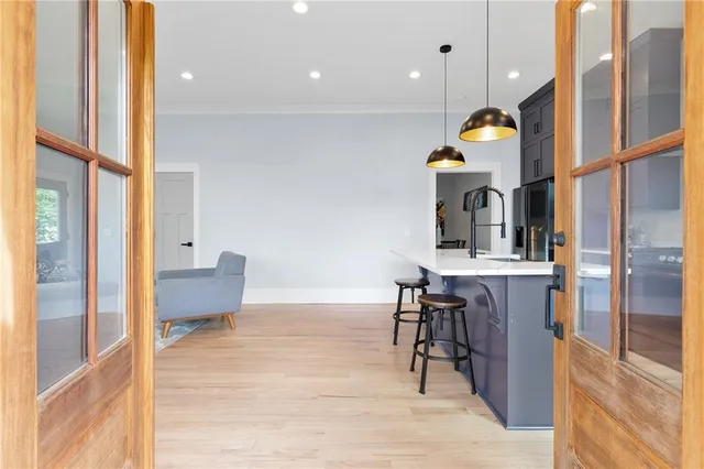 a living room with fireplace furniture and a flat screen tv