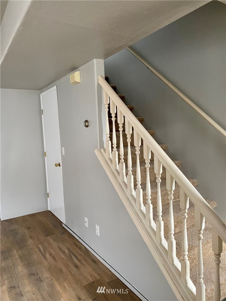 3966 Broadmoor Loop Bremerton, WA 98310 - Photo 3 of 32 a view of an entryway with wooden floor