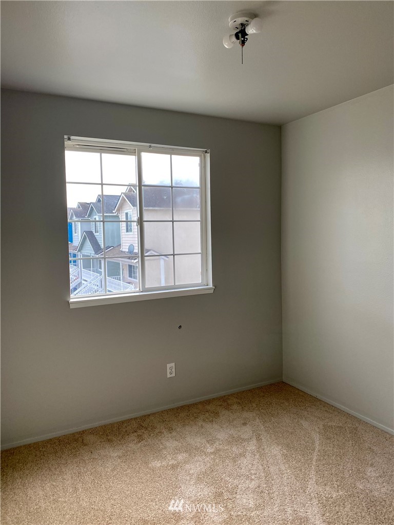 3966 Broadmoor Loop Bremerton, WA 98310 - Photo 24 of 32 an empty room with a window