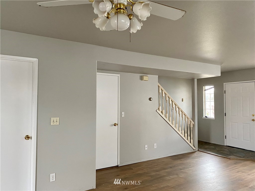 3966 Broadmoor Loop Bremerton, WA 98310 - Photo 5 of 32 a view of an entryway with a chandelier
