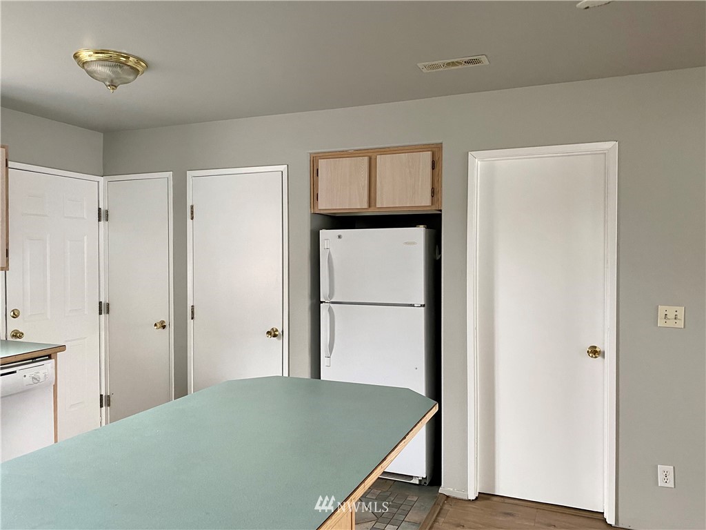 3966 Broadmoor Loop Bremerton, WA 98310 - Photo 10 of 32 a view of a hallway to rooms