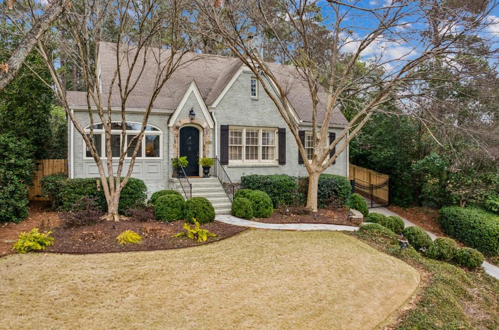 front view of a house with a yard