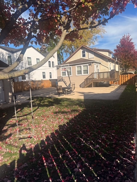 634 Spring Road Elmhurst, IL 60126 - Photo 2 of 15 a front view of a house with a garden