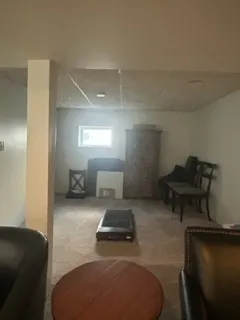 a room with furniture and a chair