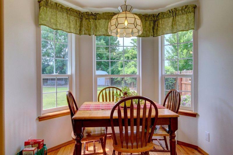 557 Mitchell Way Central Point, OR 97502 - Photo 6 of 23 a view of a dining room with furniture window and outside view