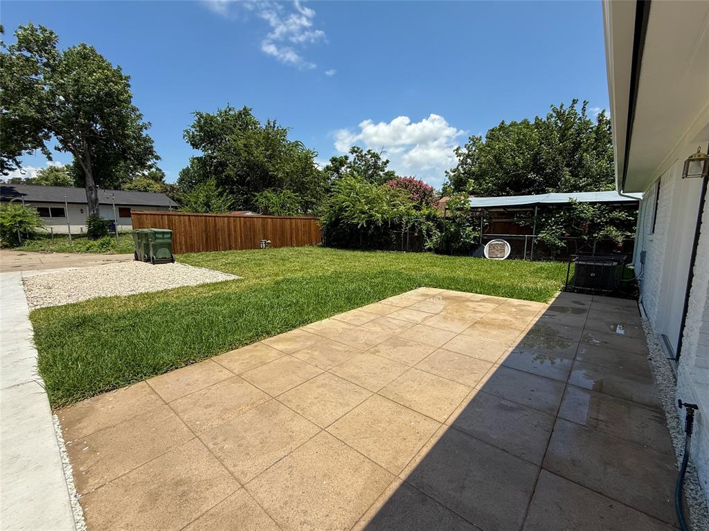 809 Longbeach Drive Garland, TX 75043 - Photo 16 of 18 Fenced backyard featuring a patio