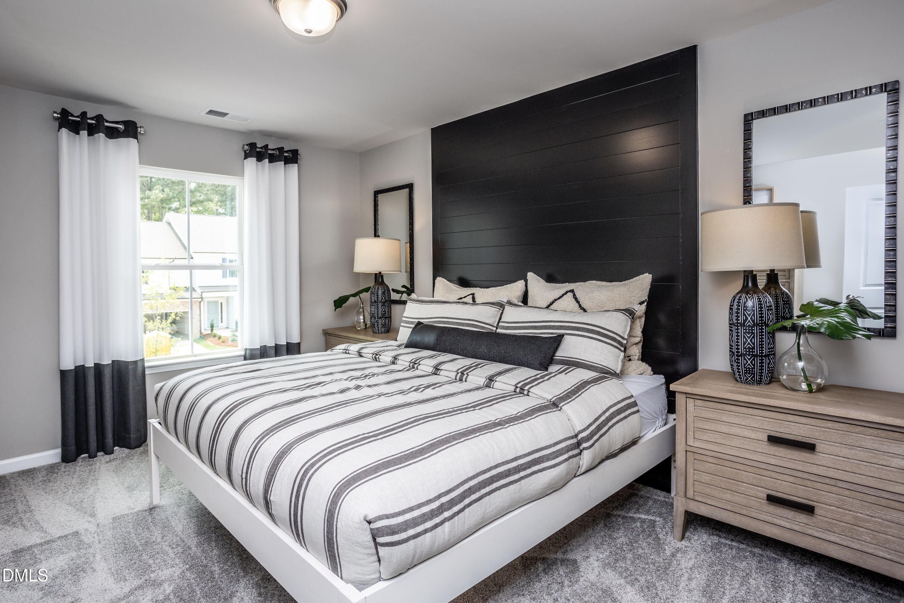 235 Broomside Avenue Raleigh, NC 27603 - Photo 15 of 25 a bedroom with bed tv and window