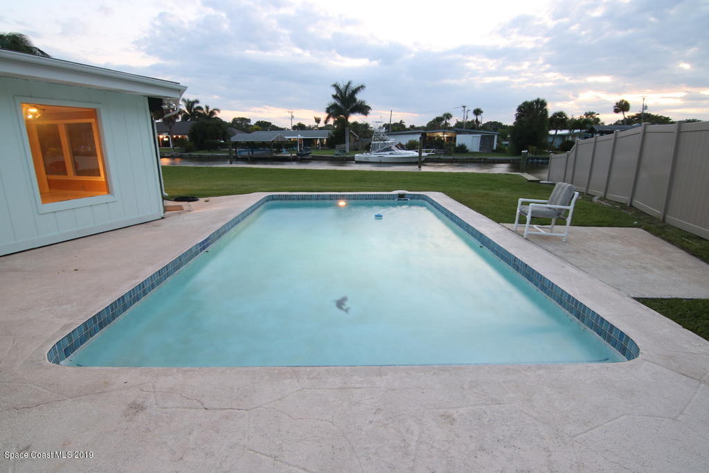 945 Trinidad Road Cocoa Beach, FL 32931 - Photo 26 of 34 a view of swimming pool