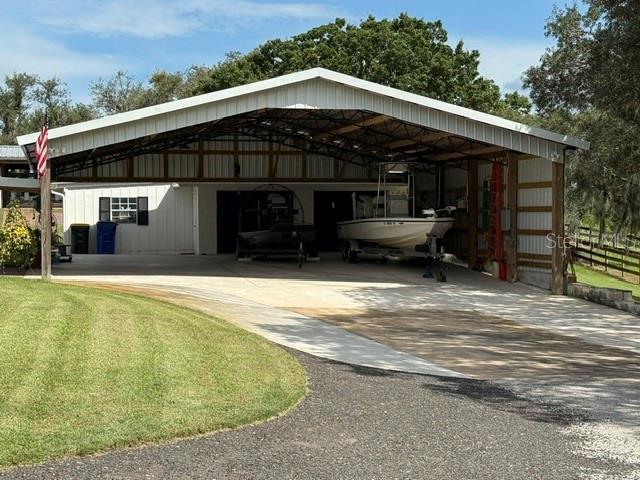 503 Bear Road Lake Placid, FL 33852 - Photo 2 of 29 a front view of a house with a yard
