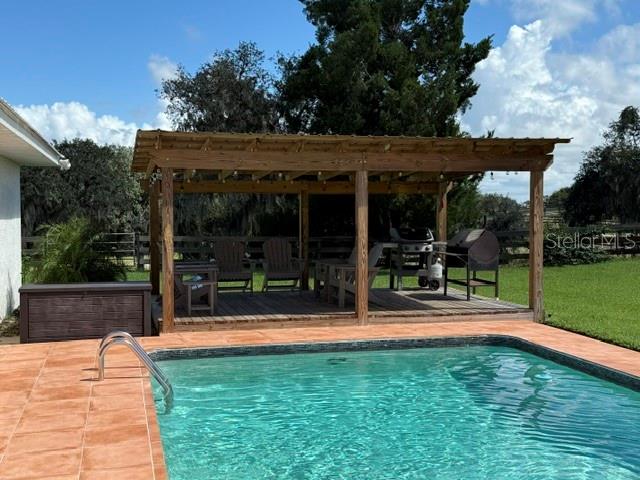 503 Bear Road Lake Placid, FL 33852 - Photo 27 of 29 a view of swimming pool with a patio