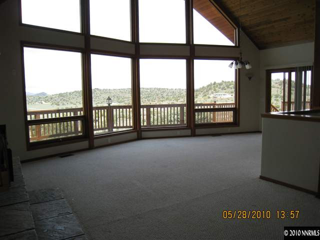 4520 Lousetown Road Reno, NV 89521 - Photo 2 of 9 a view of an empty room with a large window