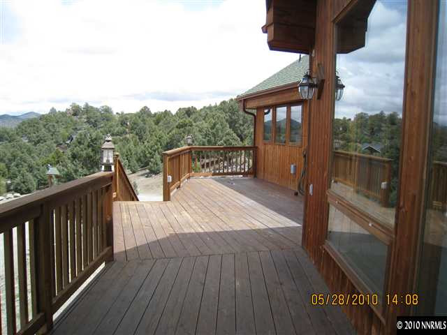 4520 Lousetown Road Reno, NV 89521 - Photo 8 of 9 a view of a balcony with wooden floor