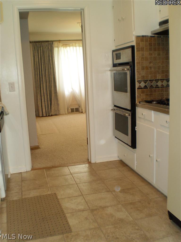 1167 Hansford Road Lyndhurst, OH 44124 - Photo 9 of 12 SS Wall Oven, Broiler and Counter Top Stove.