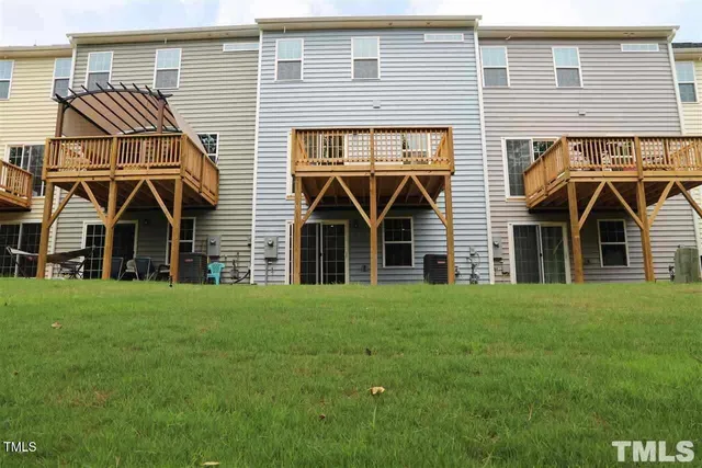 a front view of a house with yard