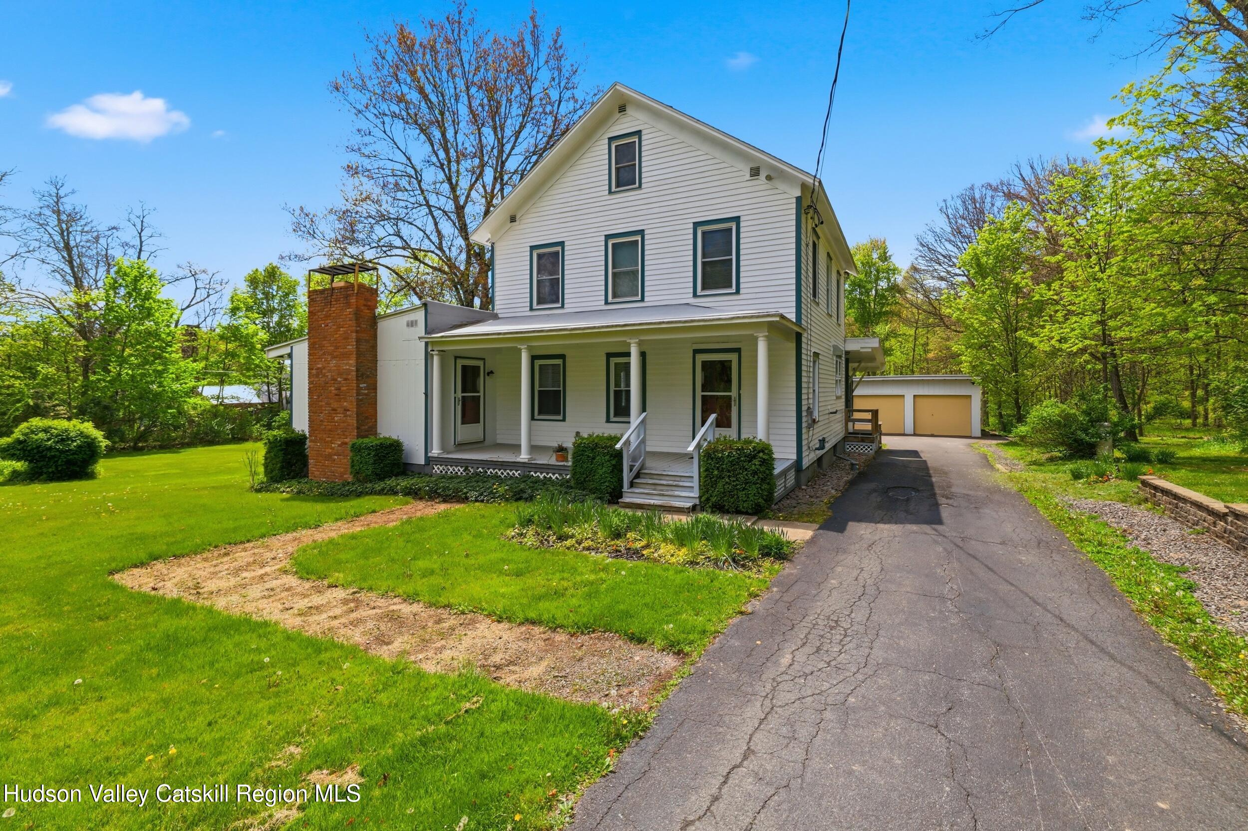 294 Kyserike Road Accord, NY 12404 - Photo 3 of 46 a front view of a house with a yard and porch