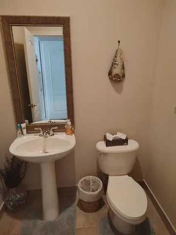 storage and utility room with washer and dryer