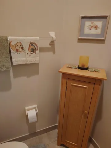 a view of storage and utility room with washer and dryer