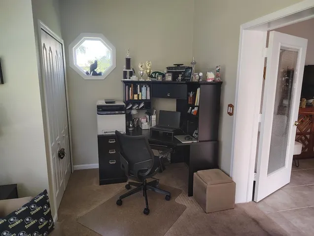 a outdoor space with a couch and a potted plant